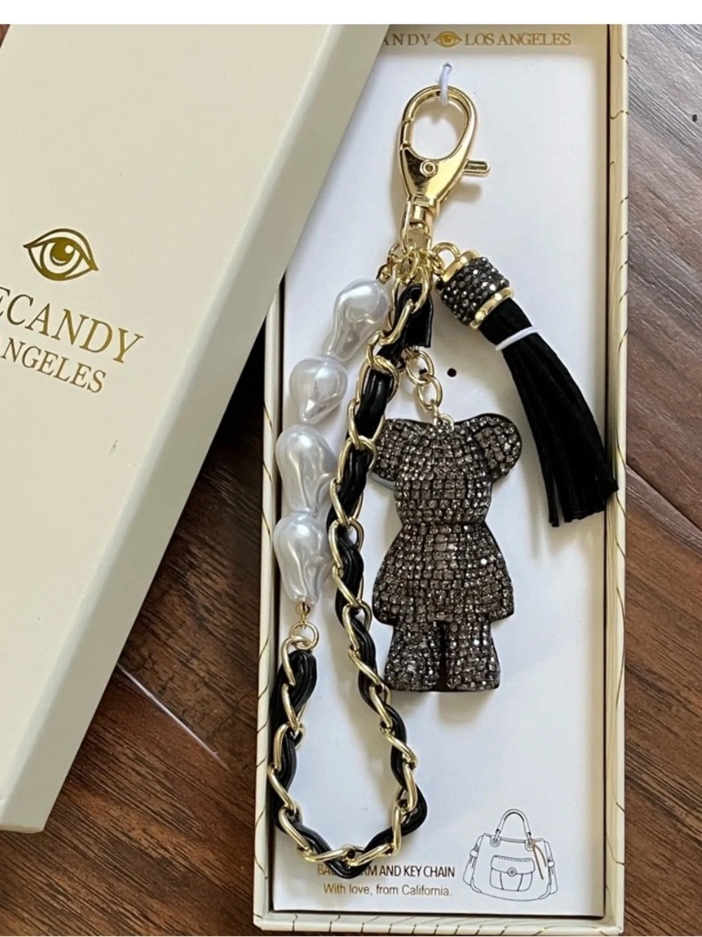 Eye Candy Black rhinestone bag charm key chain with faux pearls and gold chain